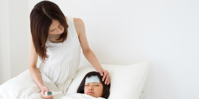 看病する母親