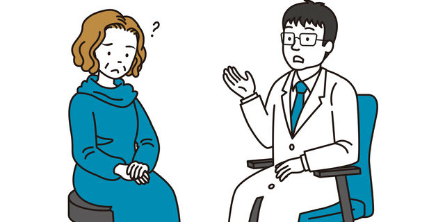 診察を受ける主婦